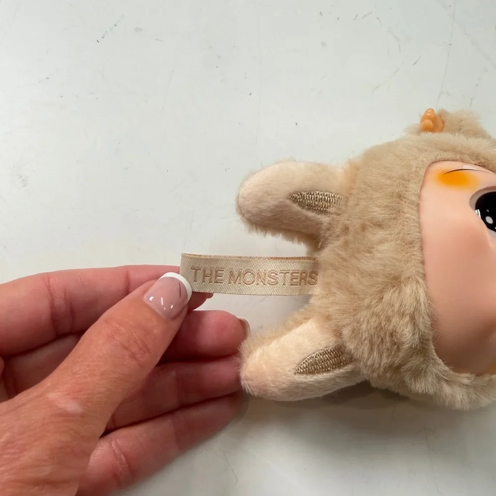 POP MART Labubu The Monsters Have a Seat Baba Vinyl Plush Pendant Beige